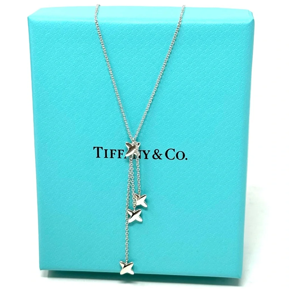 Authentic Tiffany & co. Triple X Kiss Cross Drope Necklace.